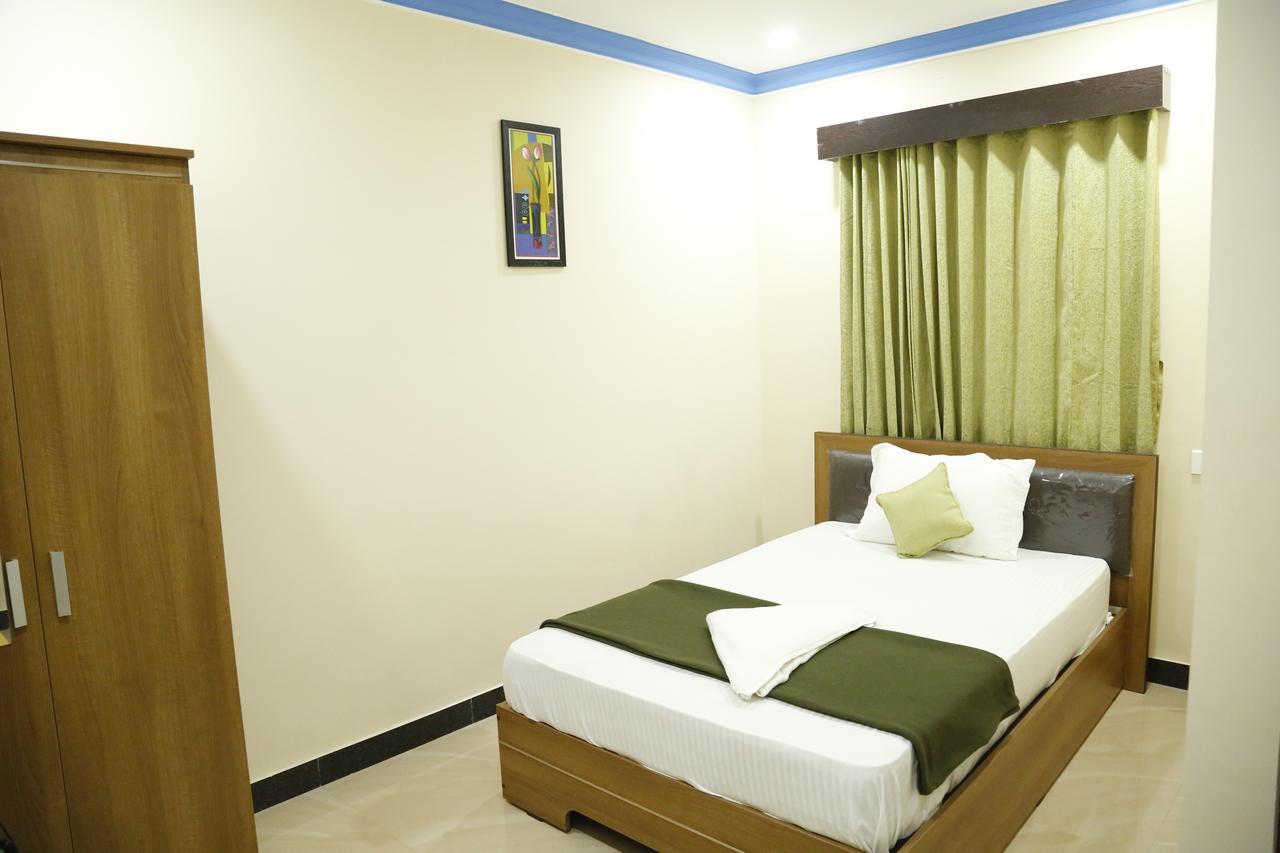 Hotel New Amirtham Inn Palani Exteriör bild