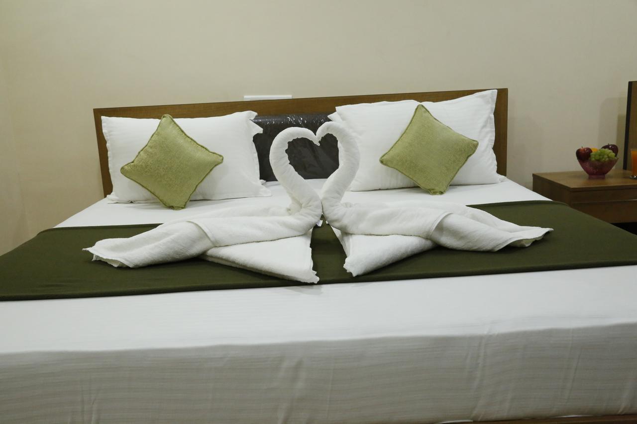 Hotel New Amirtham Inn Palani Exteriör bild